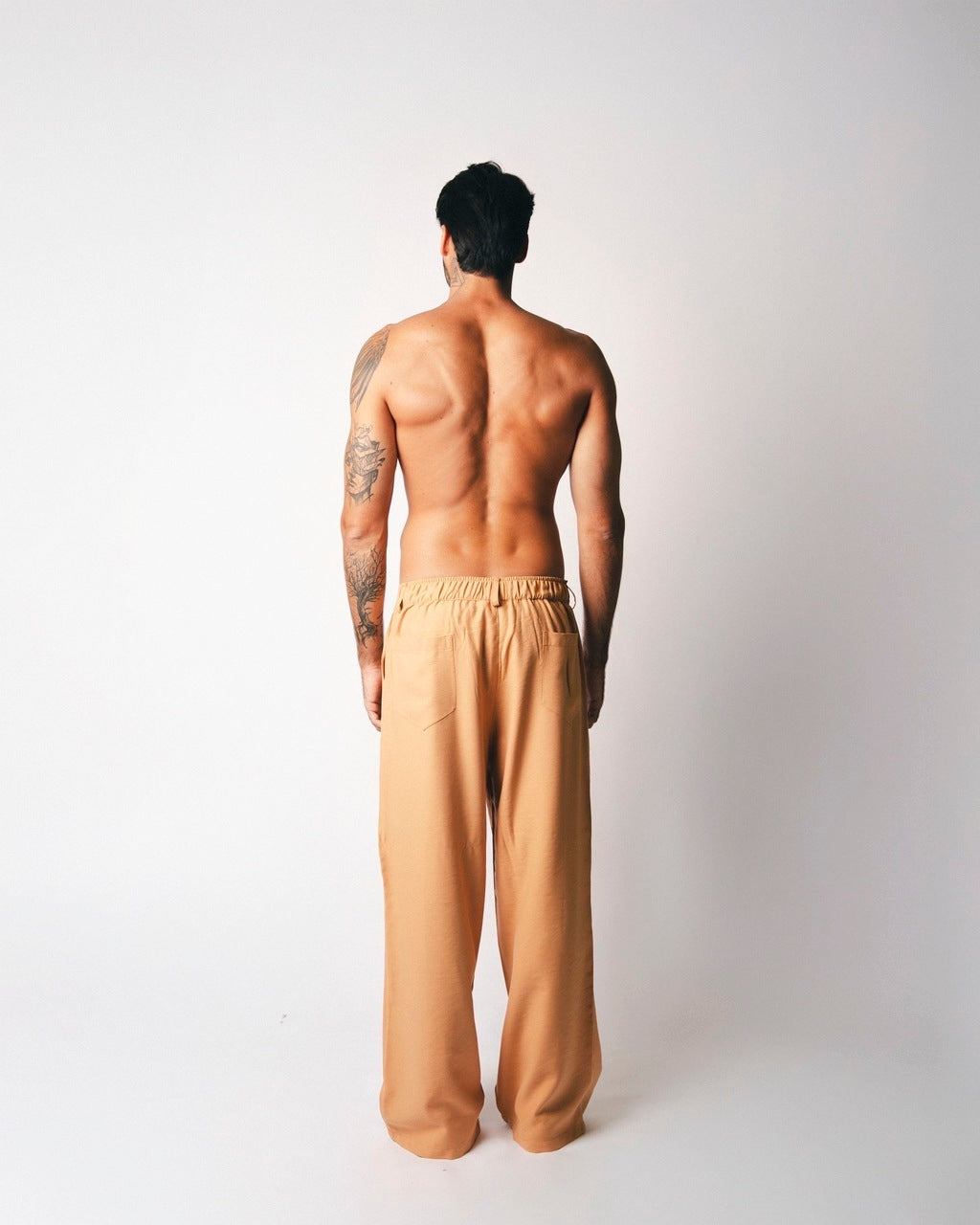 Calça Over Pregas Bege